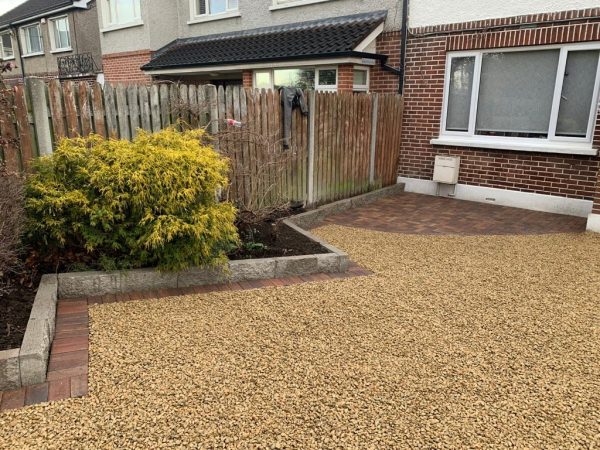 Gravel being laid on a driveway in Bishop Sutton