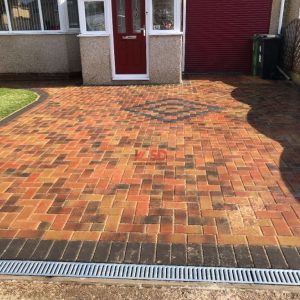 Brindle Block Paved Driveway with Roll-On Lawn in Weston-super-Mare