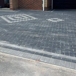 Charcoal Block Paved Driveway with Double Light Grey Edging and…