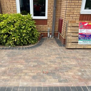 Driveway with Autumn Blend and Charcoal Block Paving in Bradley…