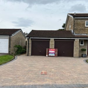 Driveway with Autumn Mix Block Paving and Charcoal Edge in…